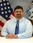 K. Bryan Mitsdarffer received the Meritorious Civilian Service Award, the third highest honorary award in the Navy, due to his work as the Chief Engineer for Microwave Devices at NSWC Crane.

Upon receiving his award, Mitsdarffer stated that he was grateful for the support from his co-workers and supervisors.

“I am very appreciative for my co-workers and supervisors who supported my nomination for this award. I have been privileged to work with many talented and capable people throughout my career. I feel that all of the good work that has been completed and referenced in the award nomination was not done alone, but with a talented group of people. Their efforts helped lead to all the success I have experienced in my career,” 

Mitsdarffer previously won the Meritorious Civilian Service Award in May 1997.