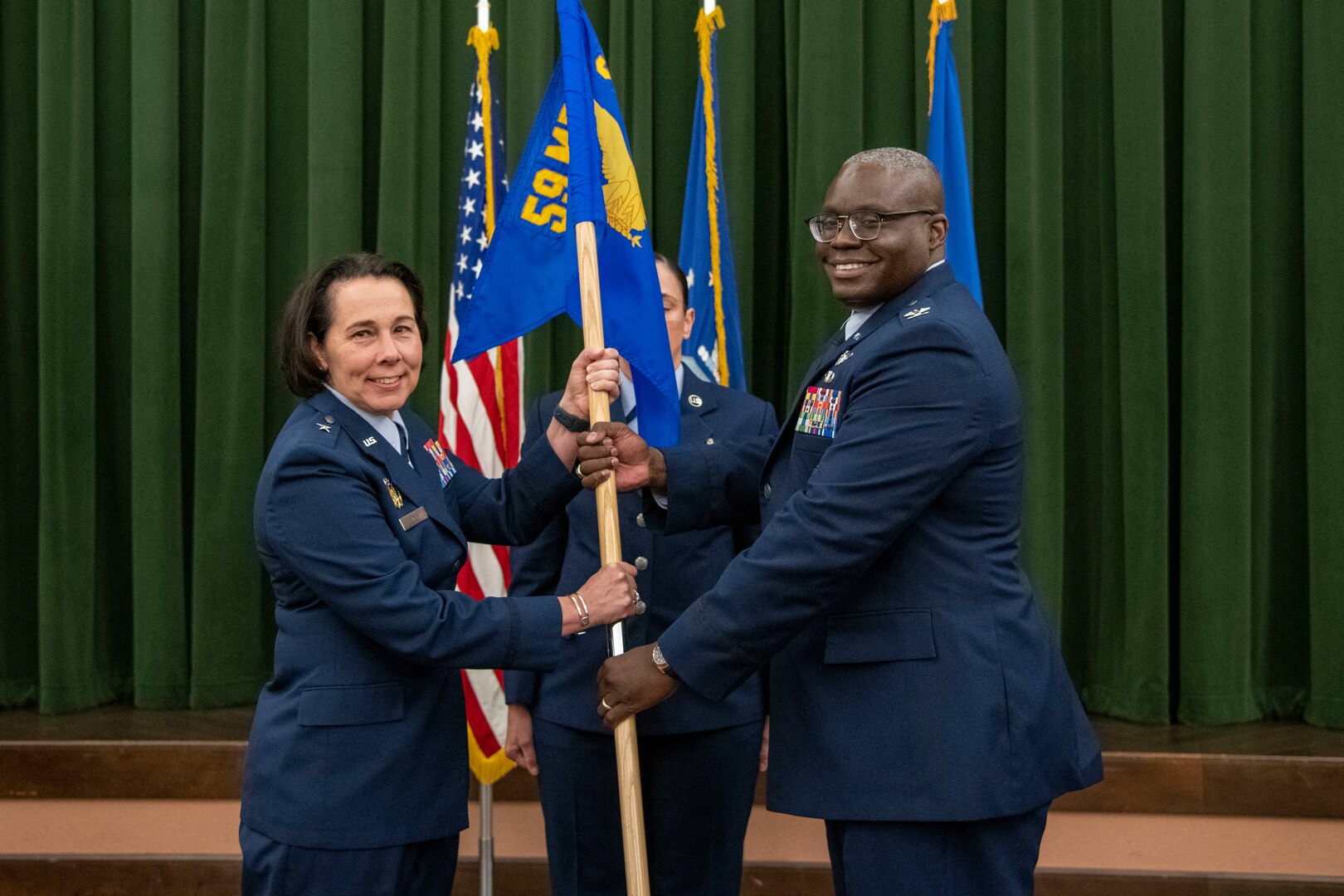 Air Force commanders pass flag in ceremony