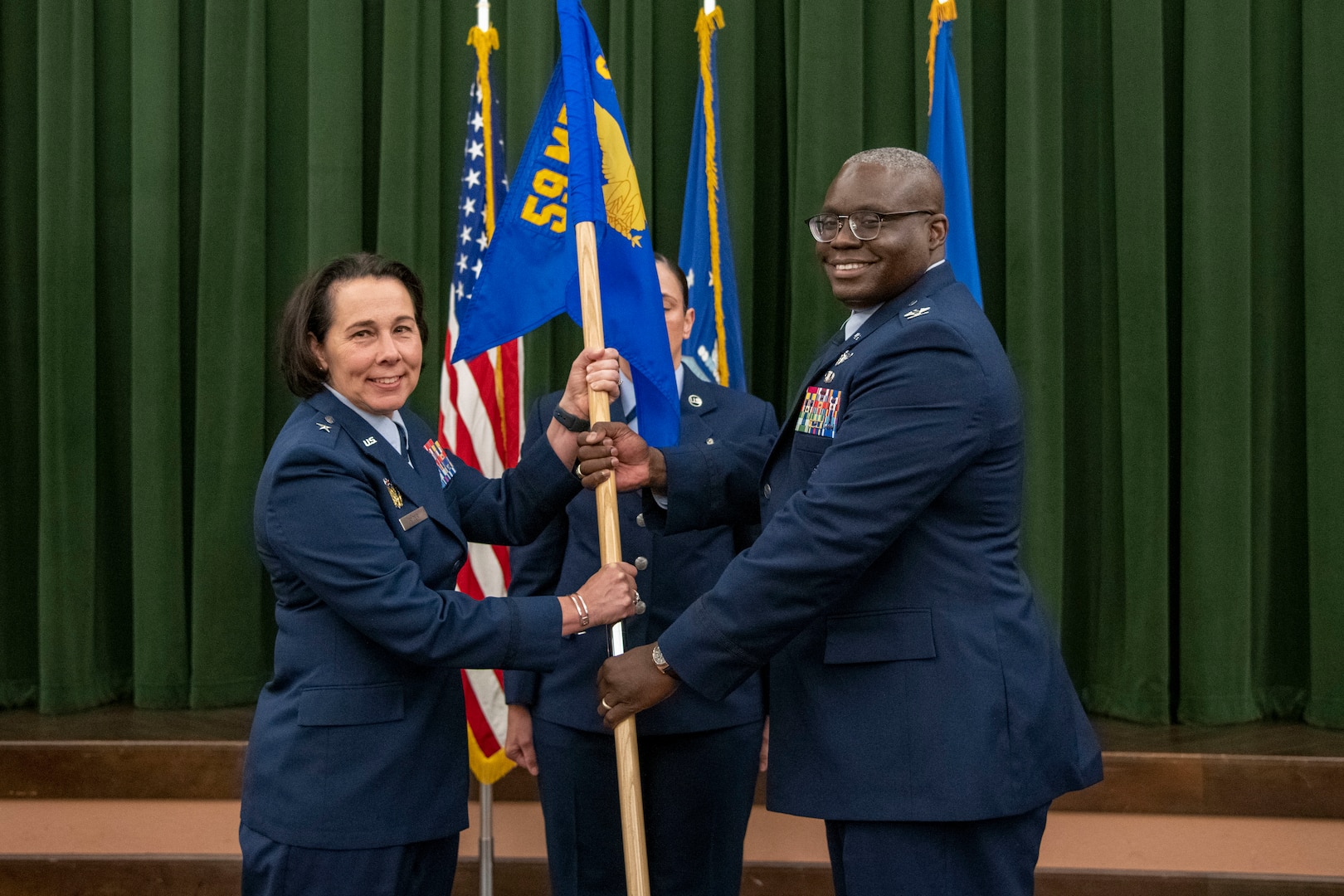 Air Force commanders pass flag in ceremony
