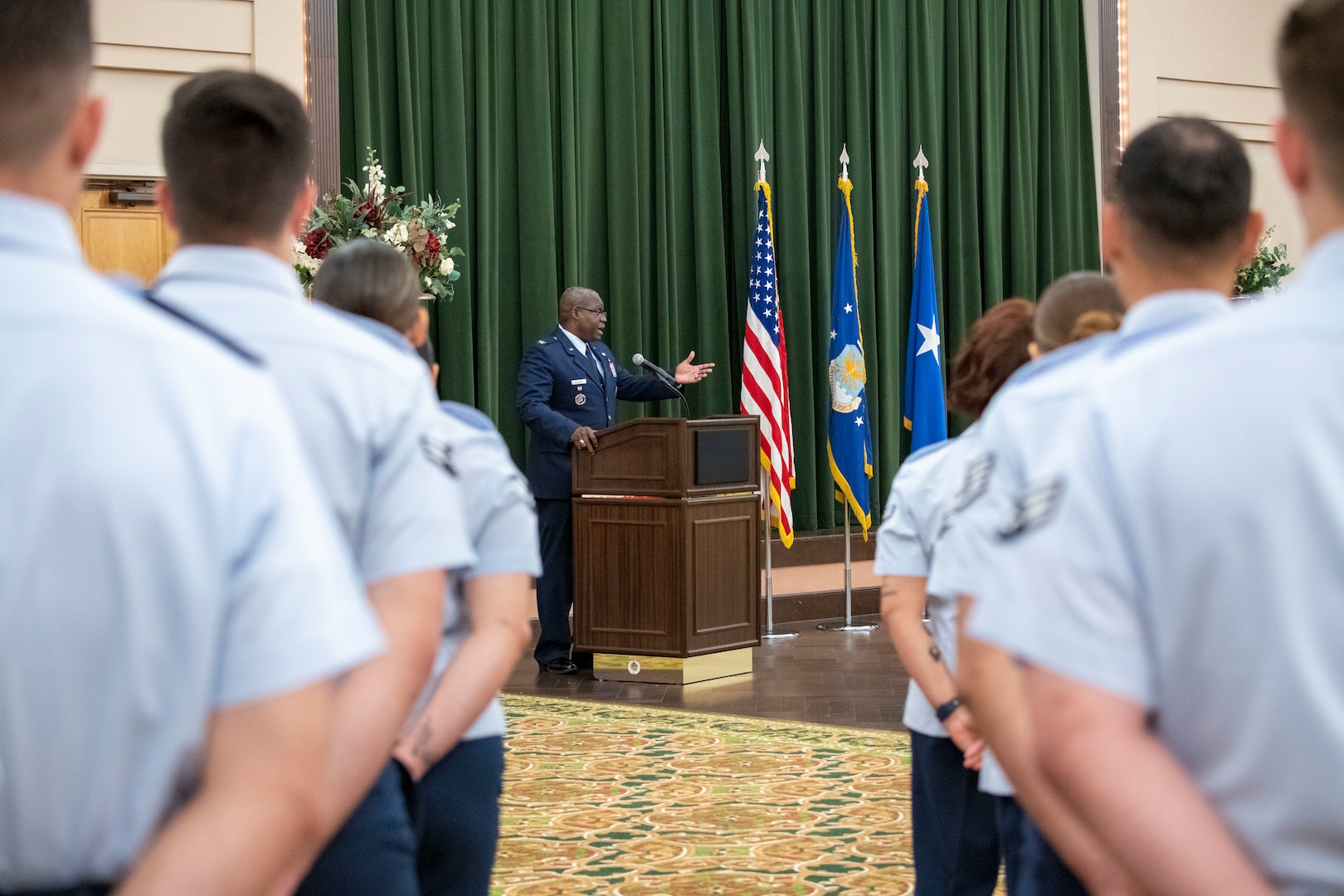 Air Force commander speaks at podium