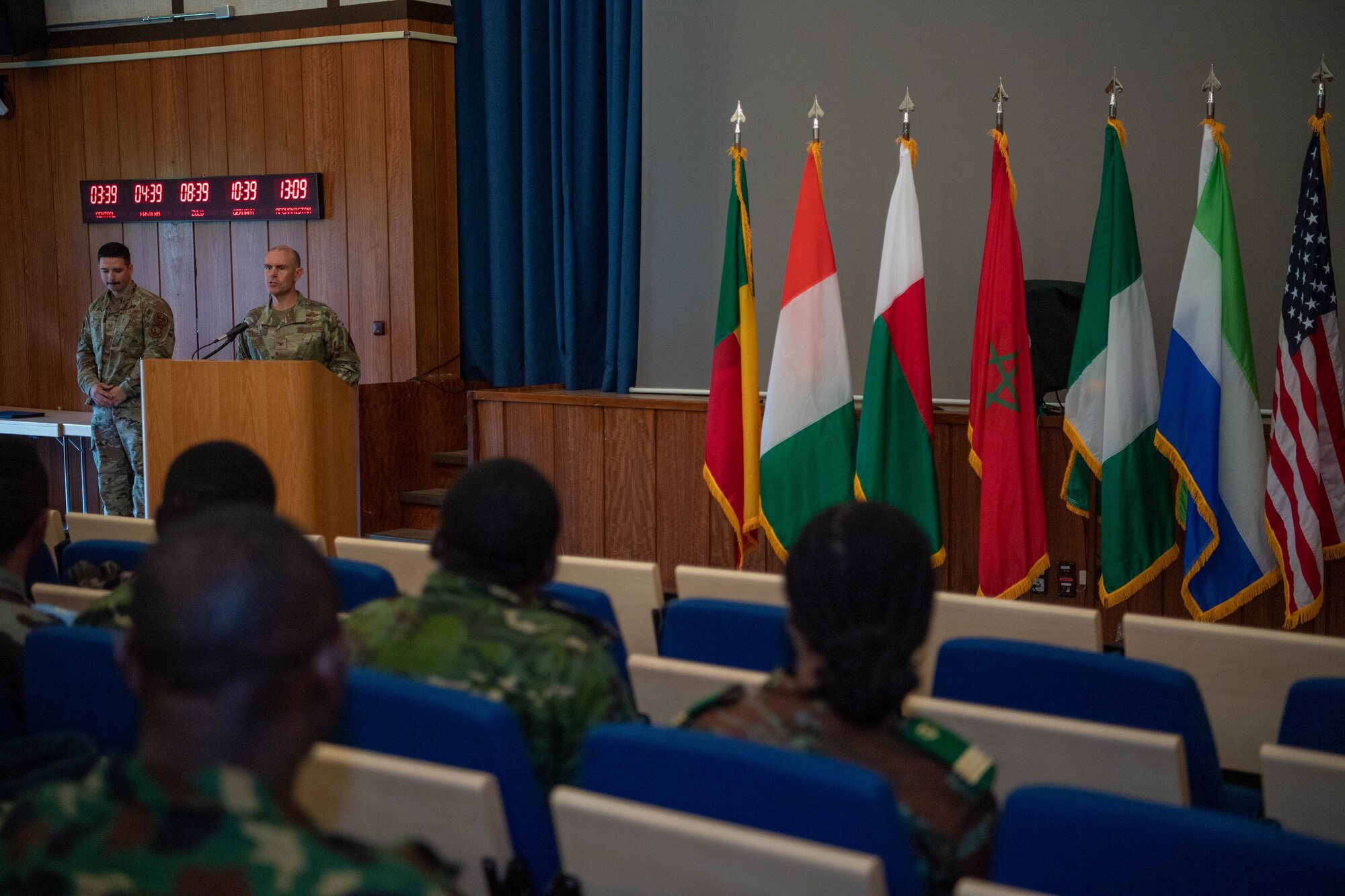 U.S. Air Force Col. Dean Berck, U.S. Air Forces Europe – Air Forces Africa Warfare Center commander, speaks to Inter-African Professional Development Seminar graduates at the Kirk Theatre, Einsiedlerhof Air Station, Germany, July 21, 2023.