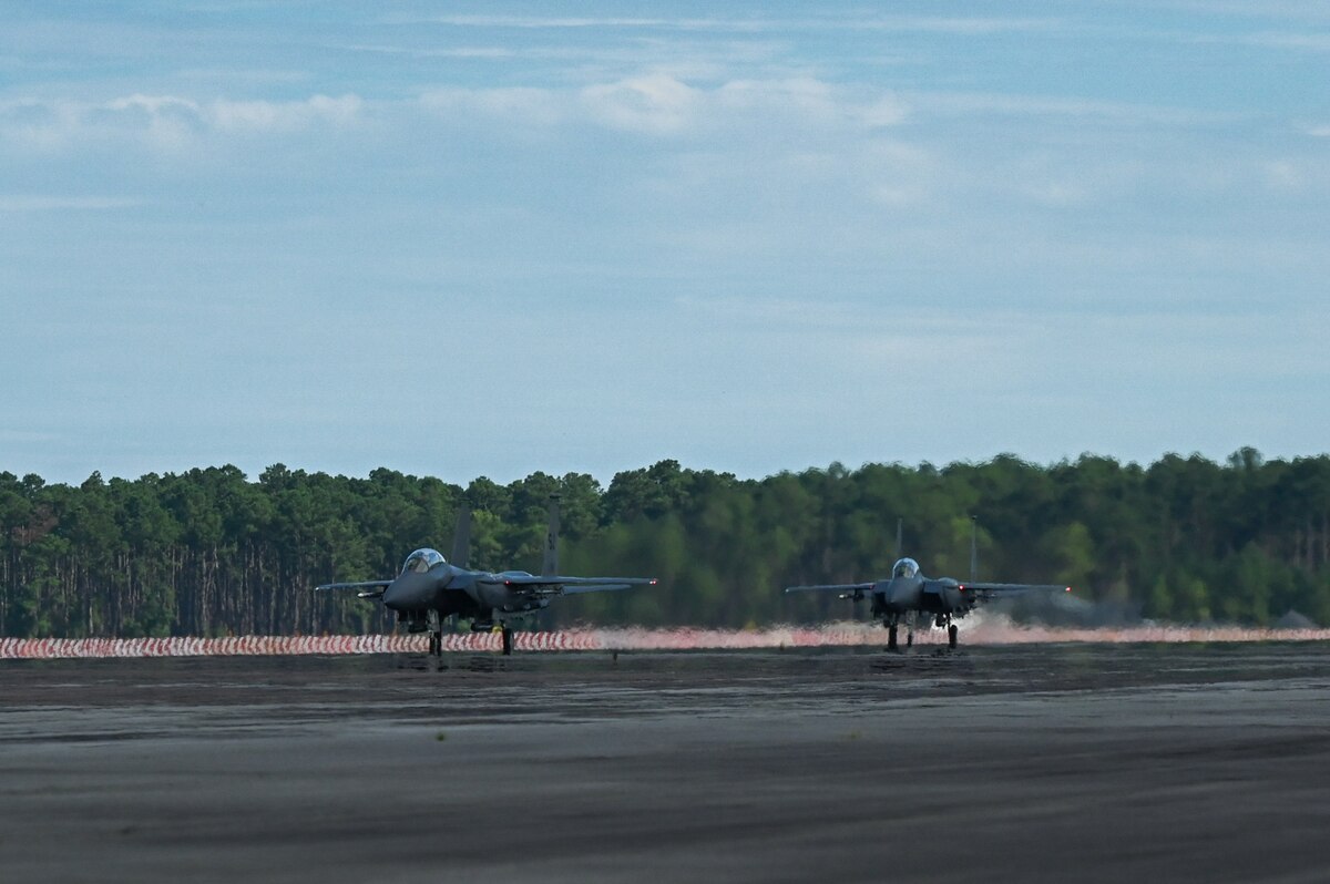 Two F-15E Strike Eagles taxi after landing at Marine Corps Air Station Cherry Point, North Carolina, in support of Razor Talon 2023, July 24, 2023. RT-23 is an agile combat employment focused exercise, designed to test the 4th Fighter Wing’s ability to operate as a lead wing to generate combat airpower while continuing to move, maneuver, sustain the wing and subordinate force elements in a dynamic contested environment. (U.S. Air Force photo by (U.S. Air Force photo by Airman 1st Class Leighton Lucero)