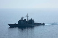 230711-N-LK647-1727 ADRIATIC SEA (July 11, 2023) The Ticonderoga-class guided missile cruiser USS Normandy (CG 60) breaks formation following a photo exercise, July 11, 2023. Normandy is part of the Gerald R. Ford Carrier Strike Group and is on a scheduled deployment in the U.S. Naval Forces Europe area of operations, employed by Sixth Fleet to defend U.S., allied, and partner interests. GRFCSG is currently participating in Neptune Strike, a multiyear effort focused on harmonizing U.S. and NATO planning teams to transfer command and control of Allied naval and amphibious forces to STRIKFORNATO, in order to provide assurance, deterrence, and collective defense for the Alliance. (U.S. Navy photo by Mass Communication Specialist 2nd Class Malachi Lakey)