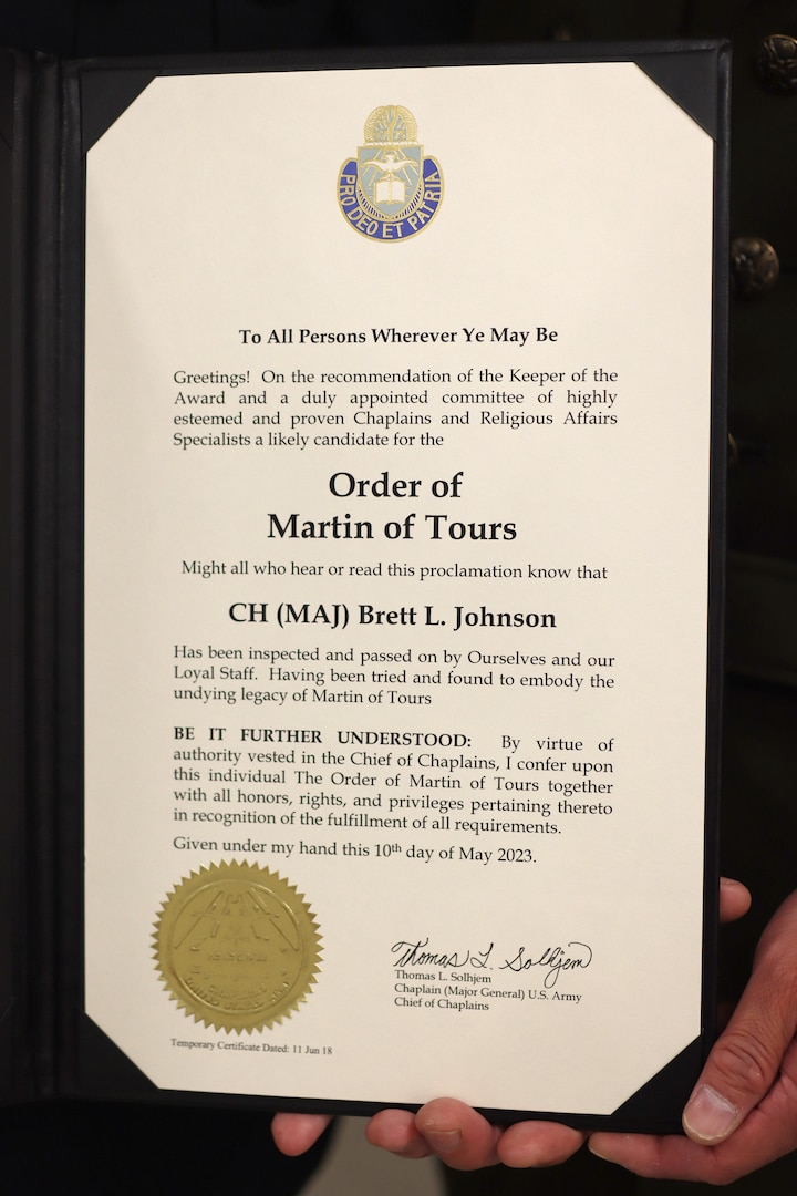 Johnson presented Order of Martin of Tours award