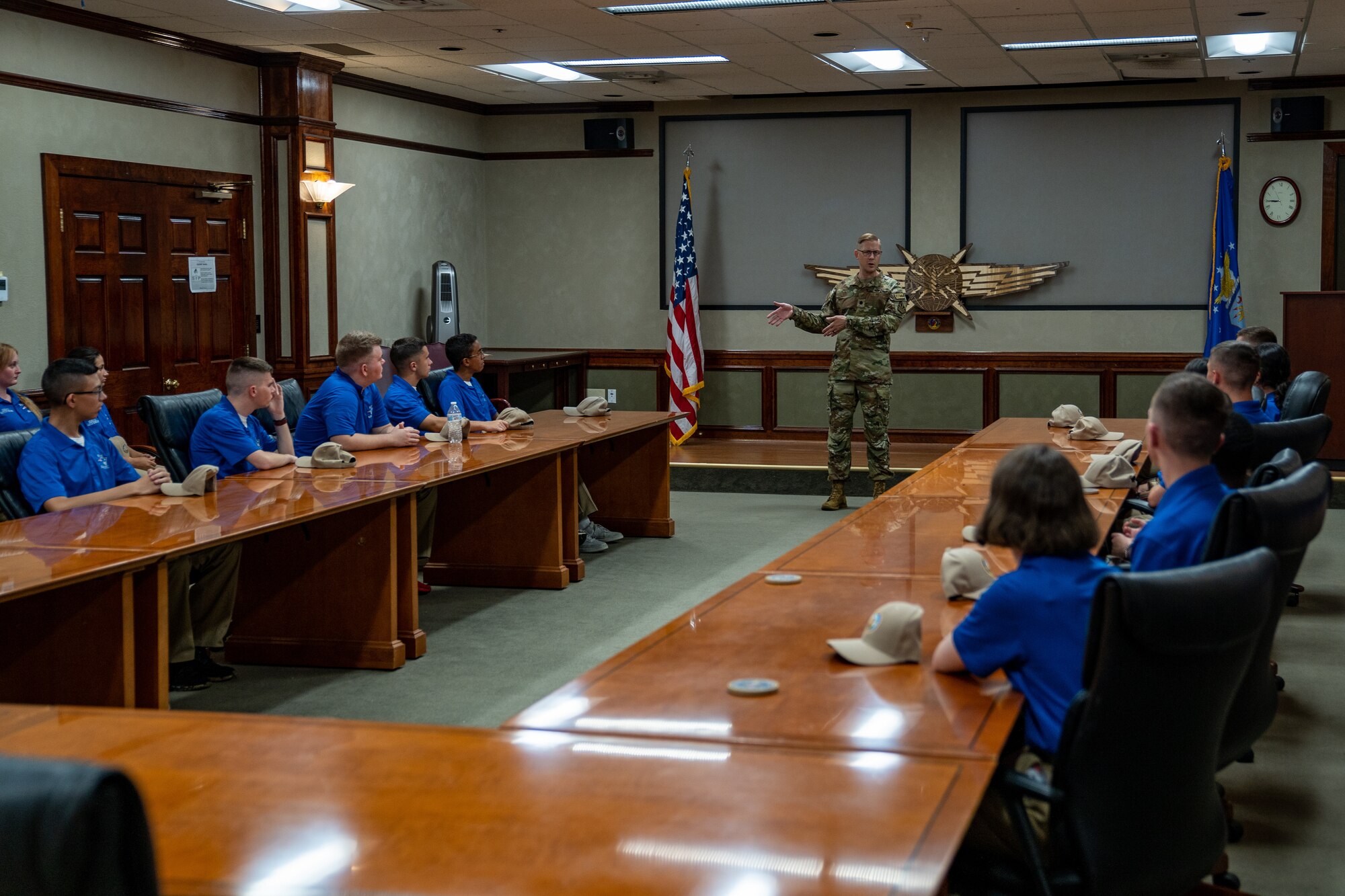 U.S. Air Force Lt. Col. Nicholas Kuc, 333rd Training Squadron commander, give a brief to Pace High School Navy Junior ROTC cadets at Keesler Air Force Base, Mississippi, July 11, 2023.