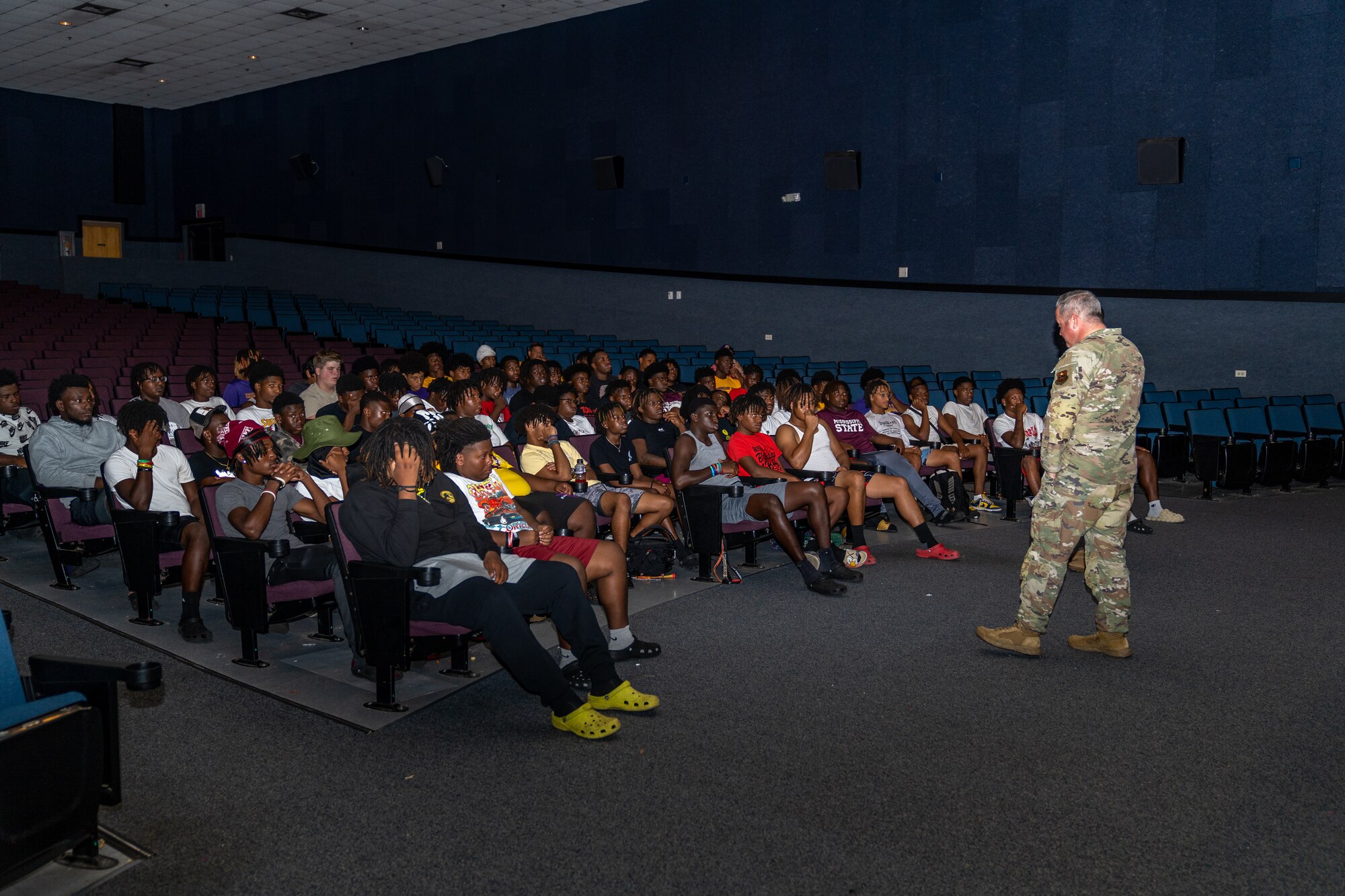 U.S. Air Force Chief Master Sgt. Jereemy Phillips, 81st Training Wing acting command chief, welcomes football players from Columbus High School at Keesler Air Force Base, Mississippi, July 17, 2023.
