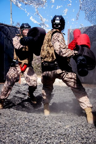 U.S. Marine Corps recruits with Kilo Company, 3rd Recruit Training Battalion, participate in a pugil sticks event at Marine Corps Recruit Depot San Diego, July 18, 2023.