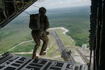Photo: Tactical Air Control Party specialists with the 137th Special Operations Wing, Oklahoma National Guard, conduct a static line jump during TRADEWINDS23 Exercise over Air Base London, Guyana, July 18, 2023. The different training components of the exercise are focused on increasing regional cooperation throughout the Caribbean and Caribbean Basin. (U.S. Air National Guard photo by Tech. Sgt. Brigette Waltermire)
