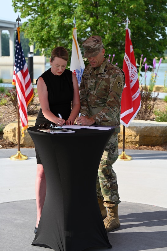 people speak during a military ceremony