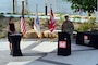 people speak during a military ceremony