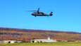 A UH-60 Black Hawk helicopter from the 28th Expeditionary Combat Aviation Brigade flies over Muir Army Airfield at Fort Indiantown Gap, Pa., on Nov. 10, 2021. (Pennsylvania National Guard photo by Brad Rhen)