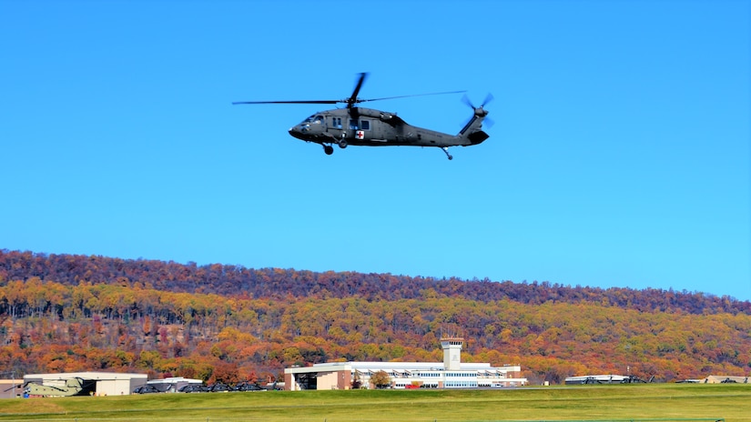 A UH-60 Black Hawk helicopter from the 28th Expeditionary Combat Aviation Brigade flies over Muir Army Airfield at Fort Indiantown Gap, Pa., on Nov. 10, 2021. (Pennsylvania National Guard photo by Brad Rhen)