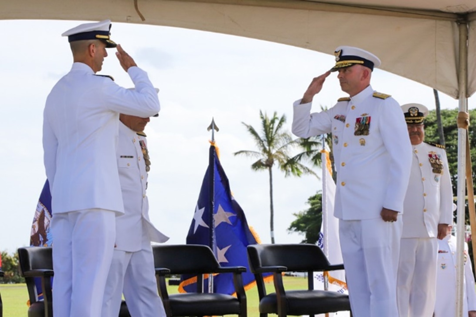 Camp H.M. Smith, Hawaii (July 12, 2023) Rear Adm. Bob Little, right, relieves Rear Adm. Charles Fosse, left, as Director of Joint Interagency Task Force- West (JIATF- West). Rear Adm. Little becomes the 20th director of JIATF- West, the executive agent for counter narcotics within the U.S. Indo-Pacific Command (USINDOPACOM) area of operations. As the JIATF- West Ddirector, he is charged with leading roughly 100 Soldiers, Sailors, Marines, Airmen, Coast Guardsmen, and Department of Defense civilians and is responsible for assisting U.S. law enforcement efforts in countering narcotics and the flow of illicit chemicals bound for the Western Hemisphere within the Indo-Pacific. (Photo by Chelsey Kaneshiro)