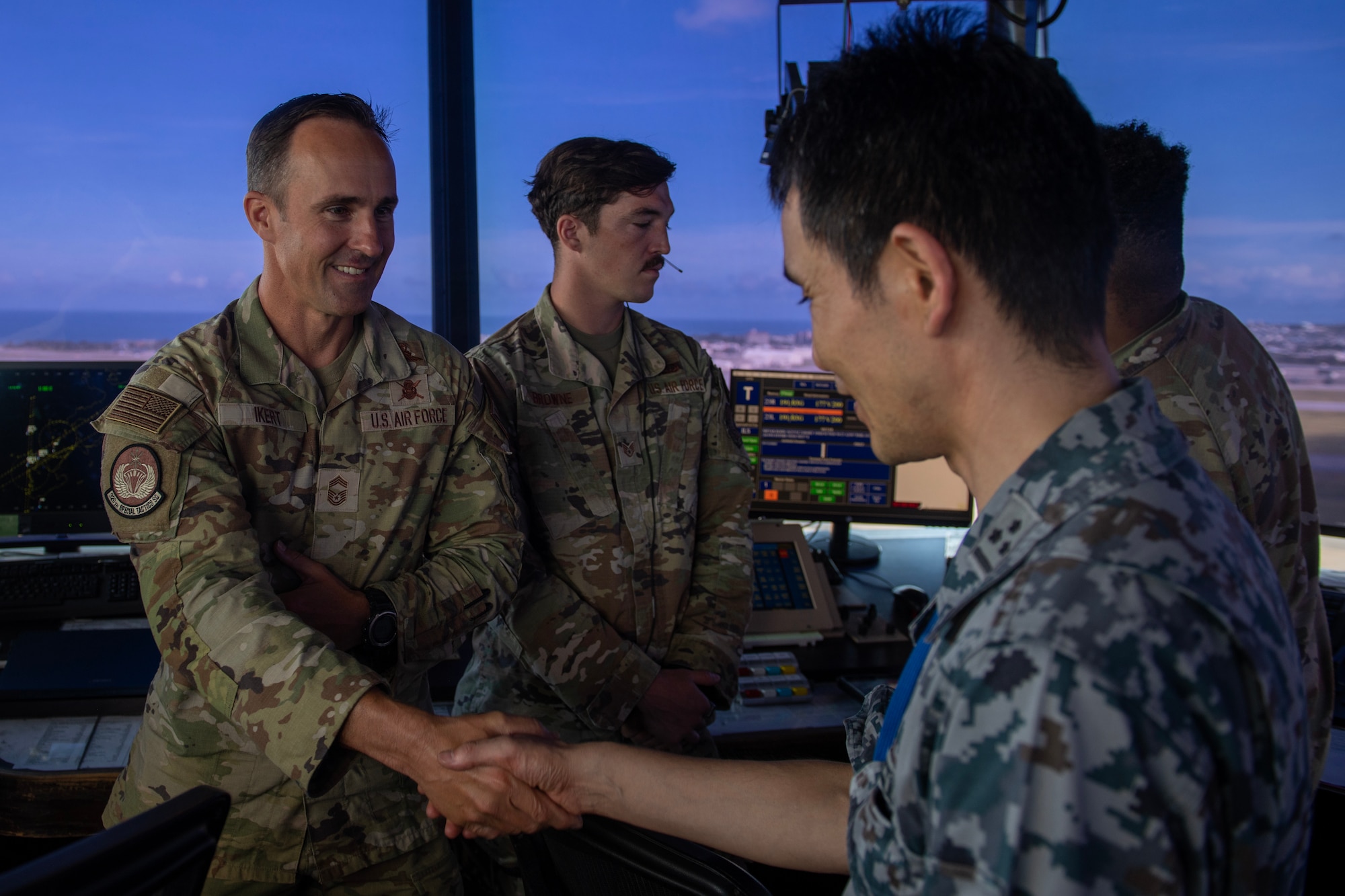 Chief Master Sgt greets JASDF officer at the Kadena Air Base Control Tower