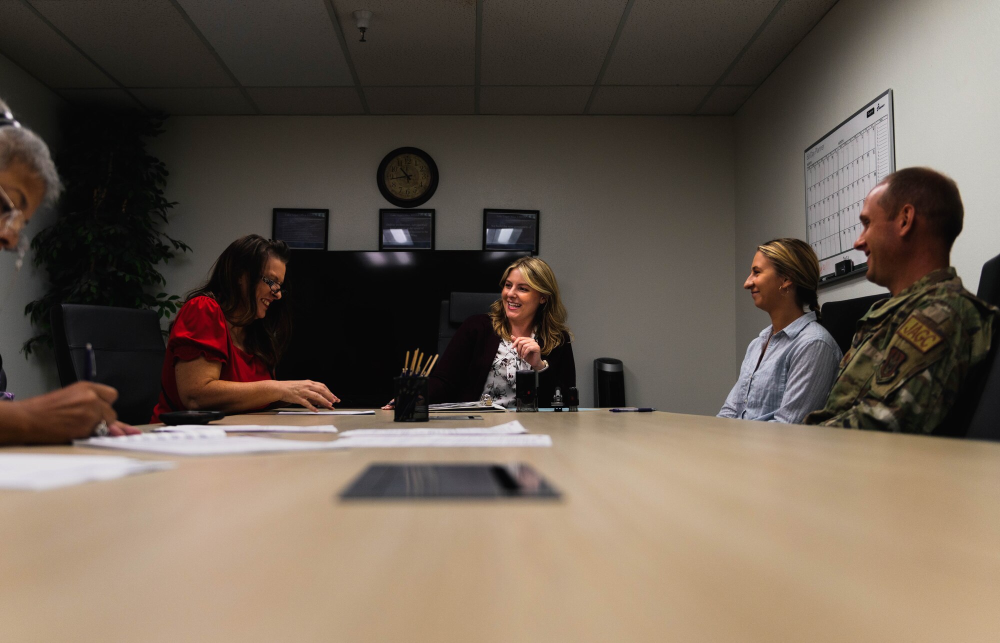 Demetria Themistocles, 56th Fighter Wing Judge Advocate attorney advisor, delegates with a client, July 26, 2023, at Luke Air Force Base, Arizona.
