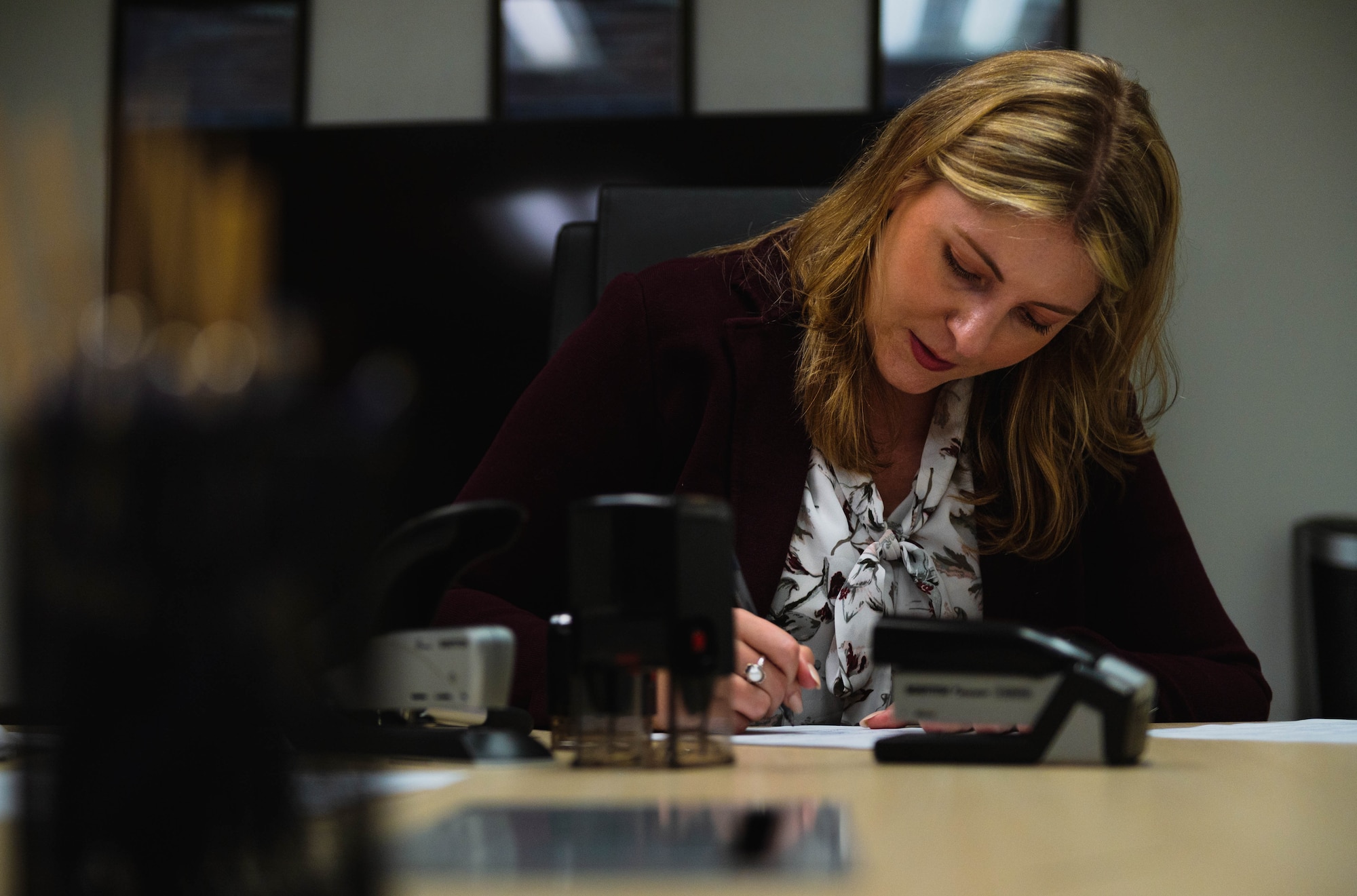 Demetria Themistocles, 56th Fighter Wing Judge Advocate Exceptional Family Member Program attorney advisor, drafts a last will and testament document, July 26, 2023, at Luke Air Force Base, Arizona.