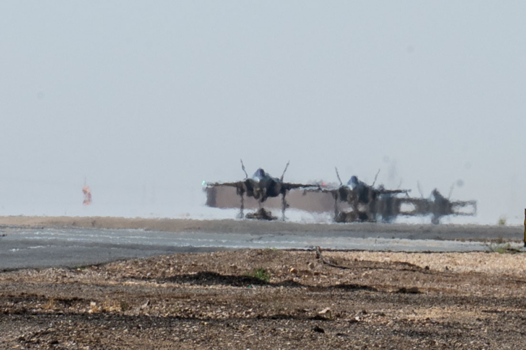 U.S. Air Force F-35A Lightning II aircraft assigned to the 421st Expeditionary Fighter Squadron taxi on a runway in the U.S. Central Command area of responsibility July 25, 2023. U.S. Air Force F-35’s have deployed to the U.S. Central Command Area of Responsibility to help defend U.S. interests, promote regional security and safeguard freedom of navigation. (U.S. Air Force photo by Staff Sgt. Christopher Sommers)