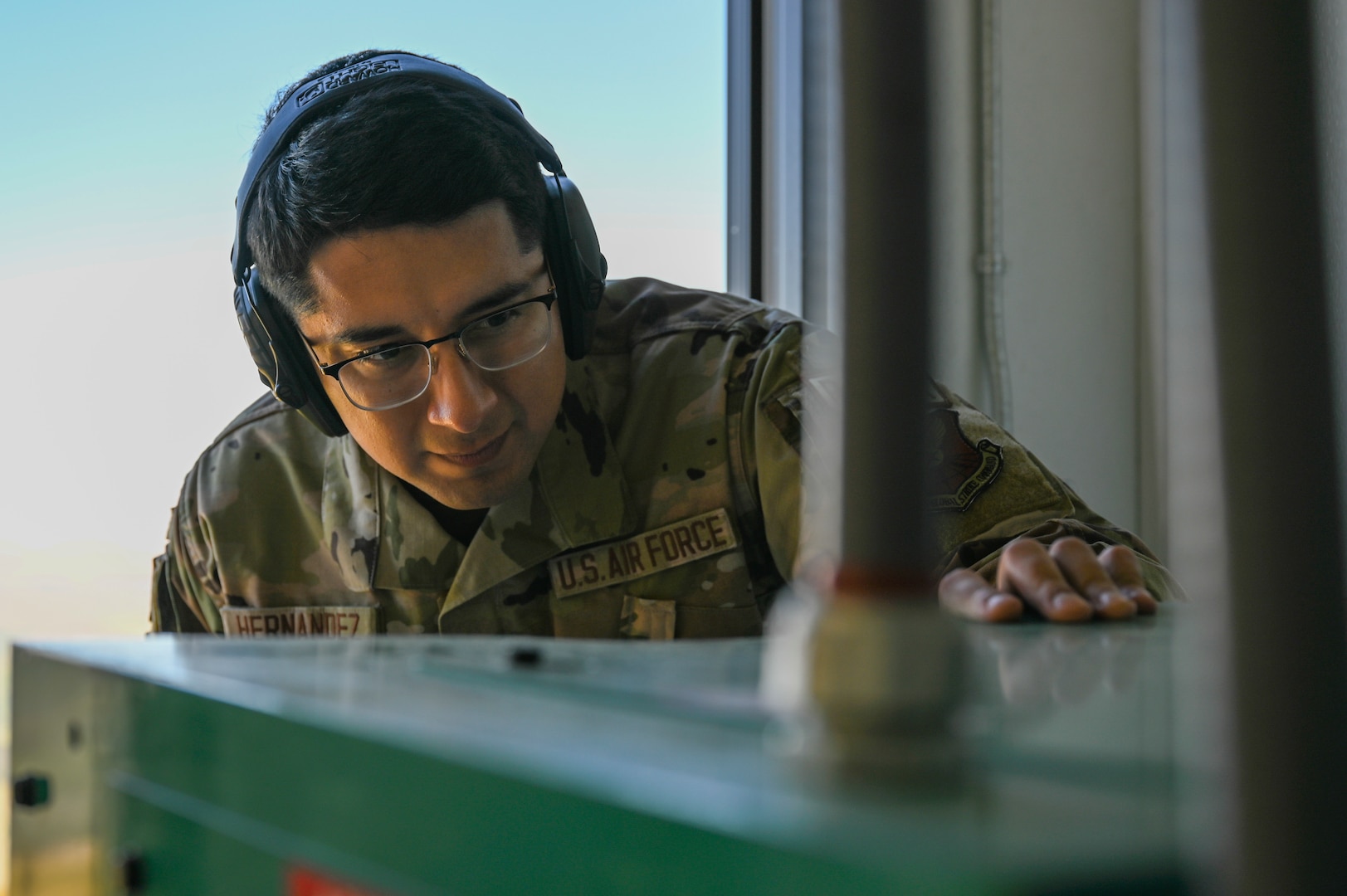 An Airman maintains a generator