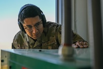 An Airman maintains a generator