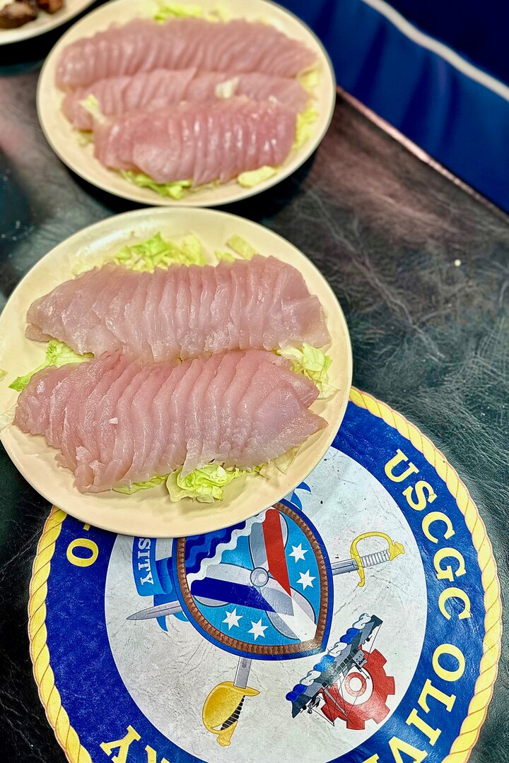Fresh wahoo sashimi, prepared by Petty Officer 1st Class Ikaika Ruiz, served aboard the USCGC Oliver Henry (WPC 1140) while underway off the Republic of Palau on April 1, 2023. Originally from Hawaii, Ruiz is an engineer aboard the ship specializing as an electrician. (U.S. Coast Guard photo by Chief Warrant Officer Sara Muir)