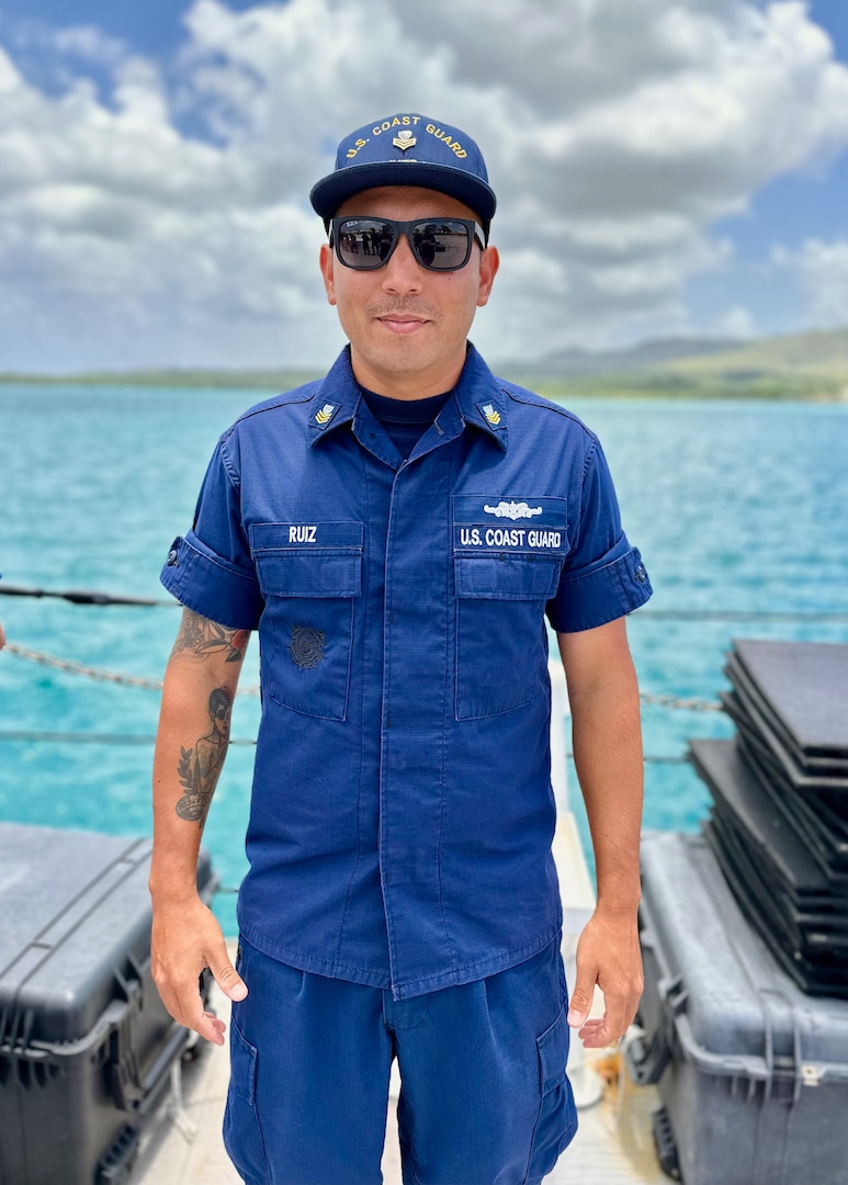 Petty Officer 1st Class Ikaika Ruiz presses stands for a photo aboard the USCGC Oliver Henry (WPC 1140) in port in Guam on April 19, 2023. Originally from Hawaii, Ruiz is an engineer aboard the ship specializing as an electrician. (U.S. Coast Guard photo by Chief Warrant Officer Sara Muir)