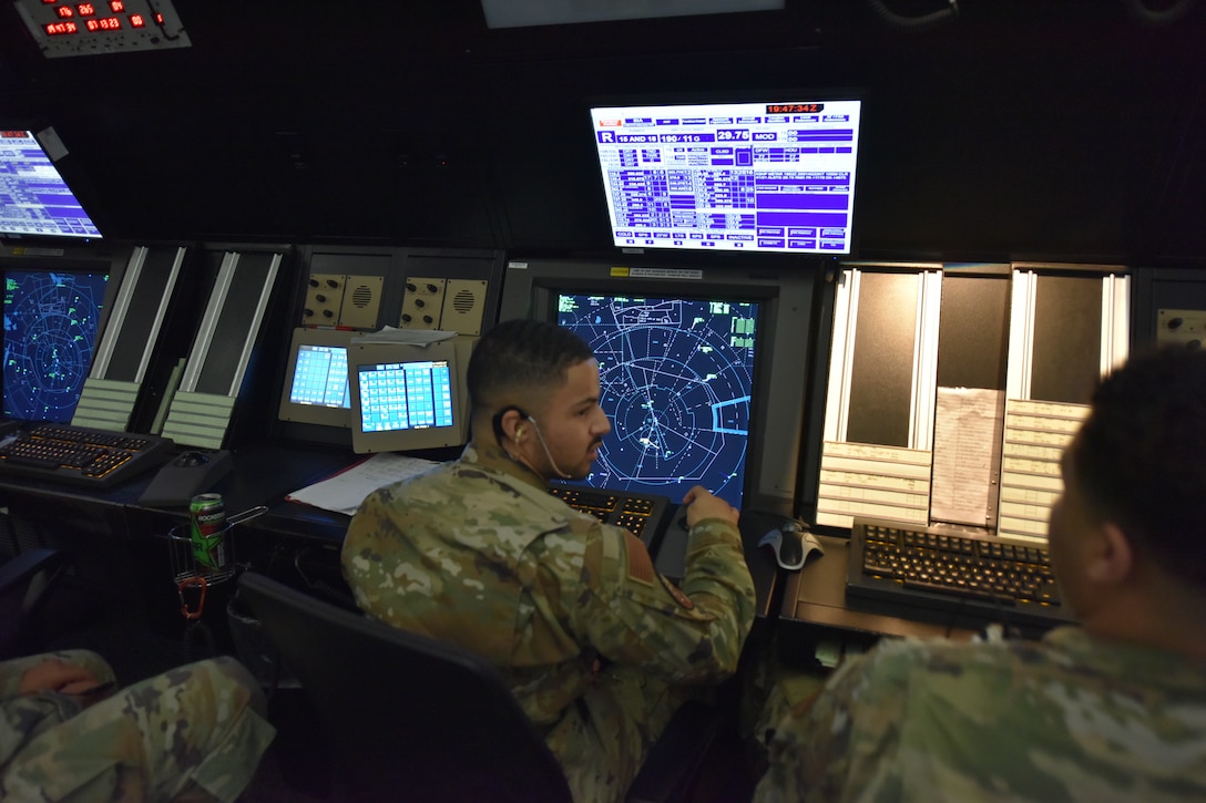 Airmen monitor the RAPCON.