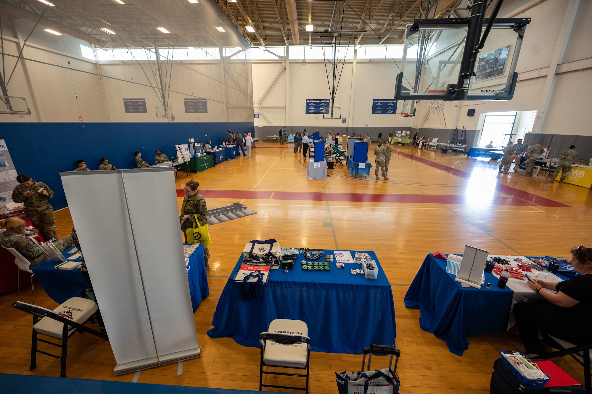 Members of Team Dover visit a variety of information booths during the 436th Force Support Squadron Health and Wellness Fair at Dover Air Force Base, Delaware, July 26, 2023. The event featured various military and civilian organizations focused on providing health resources to Airmen. (U.S. Air Force photo by Senior Airman Cydney Lee)