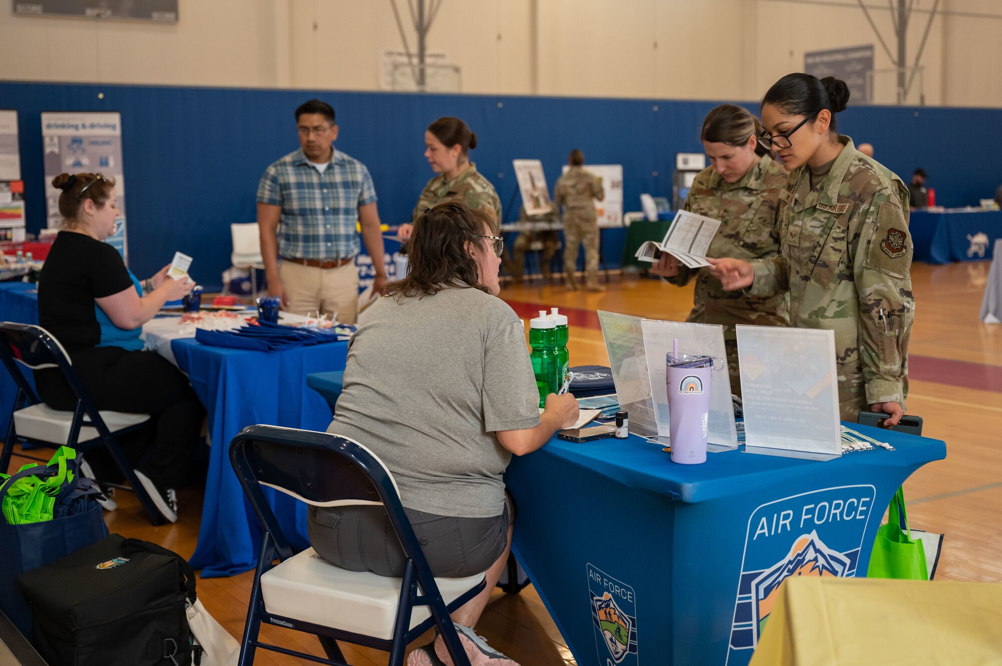 Members of Team Dover visit information booths during the 436th Force Support Squadron Health and Wellness Fair at Dover Air Force Base, Delaware, July 26, 2023. The event featured various military and civilian organizations focused on providing health resources to Airmen. (U.S. Air Force photo by Senior Airman Cydney Lee)