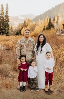 Cpl. Pelesala Faleseu, his wife Kailei, and their three children in Utah in 2022.