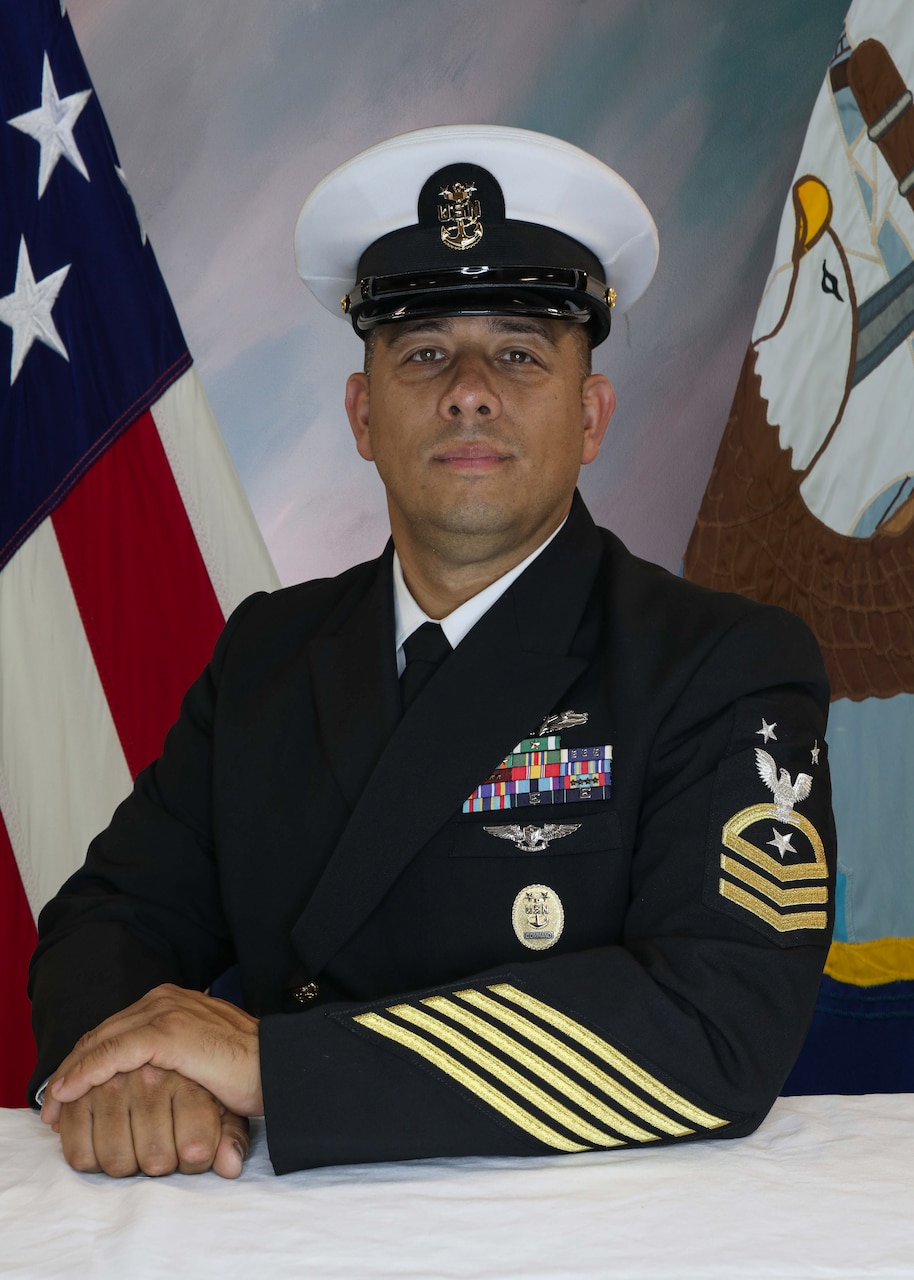 Official Studio photo of Command Master Chief Benjamin Cruz, Command Master Chief, USS Carter Hall (LSD 50)