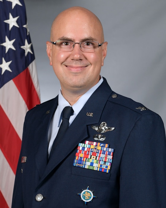 Officer posing for official photo