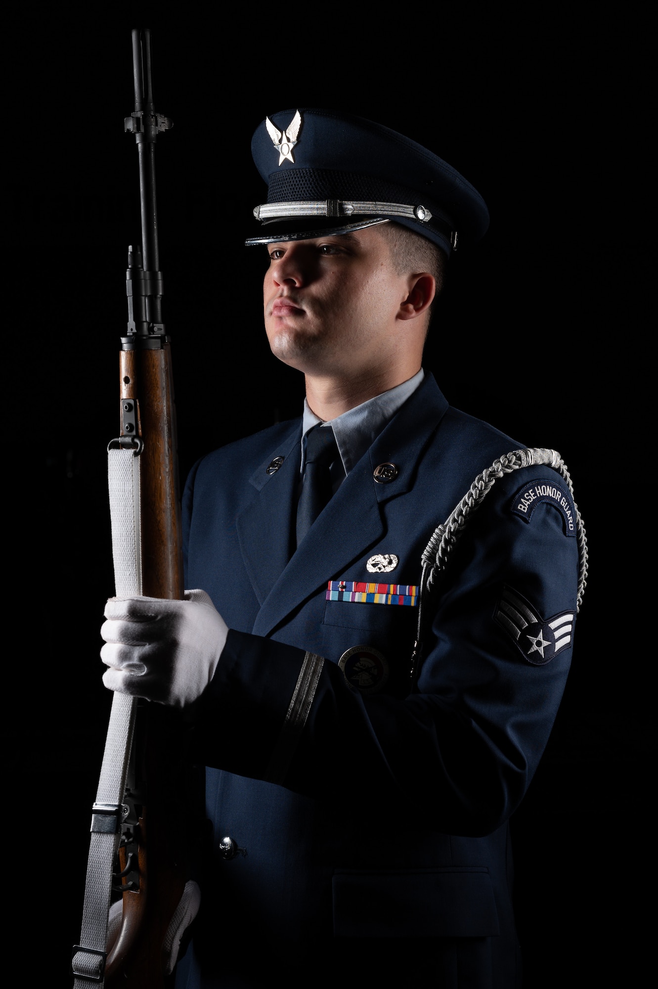 Senior Airman Tristan Henson, 436th Maintenance Squadron crew chief, practices rifle drill movements at the Dover Air Force Base Honor Guard facility at Dover Air Force Base, Delaware, July 25, 2023. Members of the Honor Guard conduct countless hours learning and perfecting precise movements for military ceremonies and funeral services. (U.S. Air Force by Mauricio Campino)