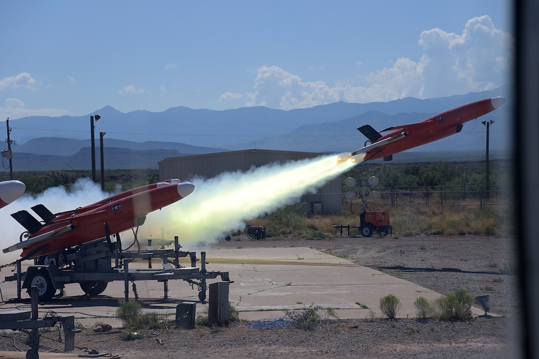 BQM-177 aerial targets, managed by NAVAIR PMA-208 at Naval Air Station Patuxent River, Virginia, are launched during a live fire test. Originally designed for cruise missile defense, Program Executive Officer Land Systems’ Medium Range Intercept Capability system has proven its versatile prowess against other airborne threats during highly successful range tests