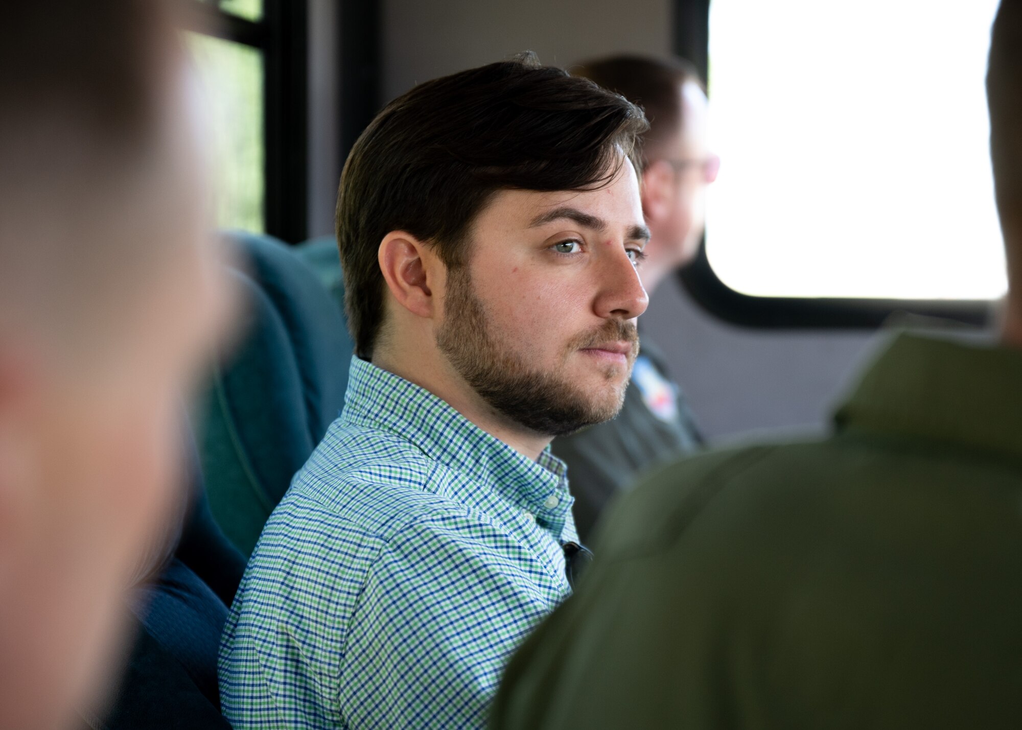 A man sits on a bus during a tour of Shaw Air Force Base, S.C.