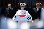 Republic of Korea (ROK) Senior Chief Petty Officer Ho Jong Choi, the nephew of Private First Class Imrac Choi, a ROK servicemember who was killed in action during the Korean War and recently identified by the Defense POW/MIA Accounting Agency, carries a transfer case during the Korean War Remains Repatriation Ceremony at Joint Base Pearl Harbor-Hickam, Hawaii, July 25, 2023. The purpose of the ceremony was to transfer the remains and commemorate the service of seven
fallen South Korean soldiers who fought alongside U.S. and United Nations forces during the Korean
War. The remains were analyzed jointly by the DPAA laboratory and scientists with the Republic of
Korea's Ministry of National Defense Agency for KIA Recovery and Identification (MAKRI). Working
cooperatively, they concluded that the seven individual remains are of South Korean origin, though
six of the remains haven’t been individually identified. (U.S. Marine Corps photo by Sgt. Zachary T. Beatty)