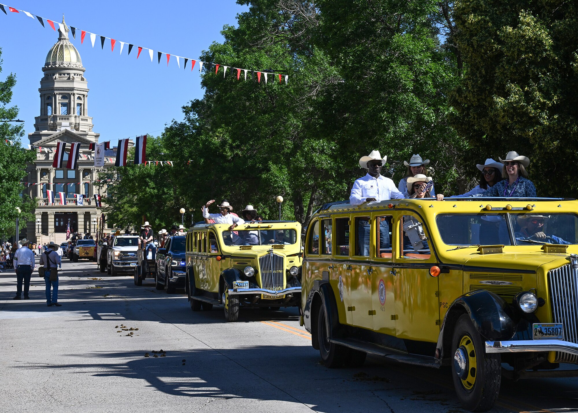 commander riding in yellow vehicle
