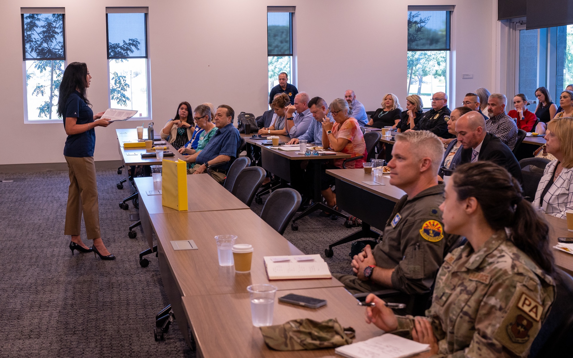 Christine Siddens, 56th Fighter Wing community partnership director, briefs members of the Air Force Community Partnership Program on July 25, 2023, at the Goodyear City Hall in Goodyear, Arizona.