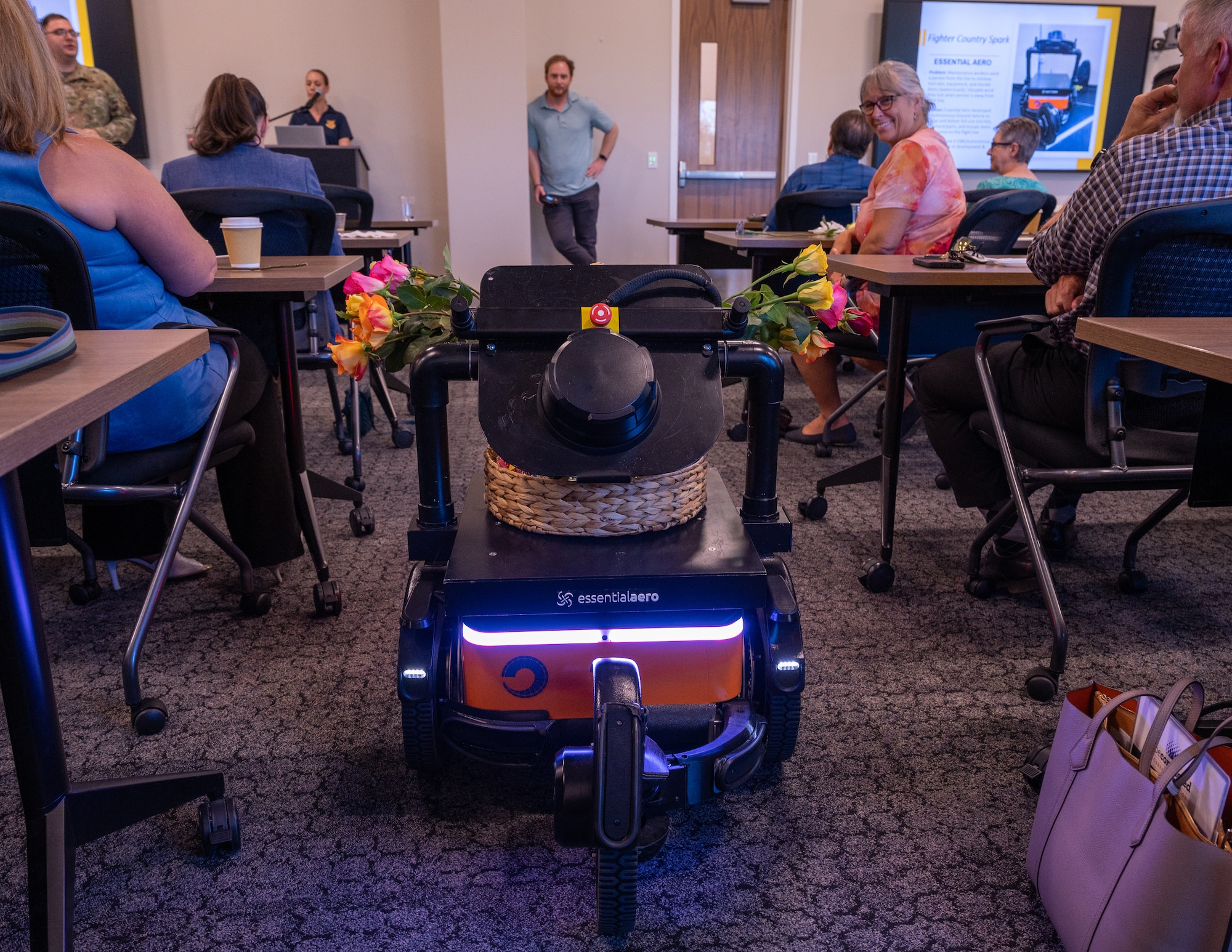 The Essential Aero Autonomous Ground Vehicle, an automated delivery robot for maintenance personnel, is presented by the Fighter Country Spark team July 25, 2023, at the Goodyear City Hall in Goodyear, Arizona.