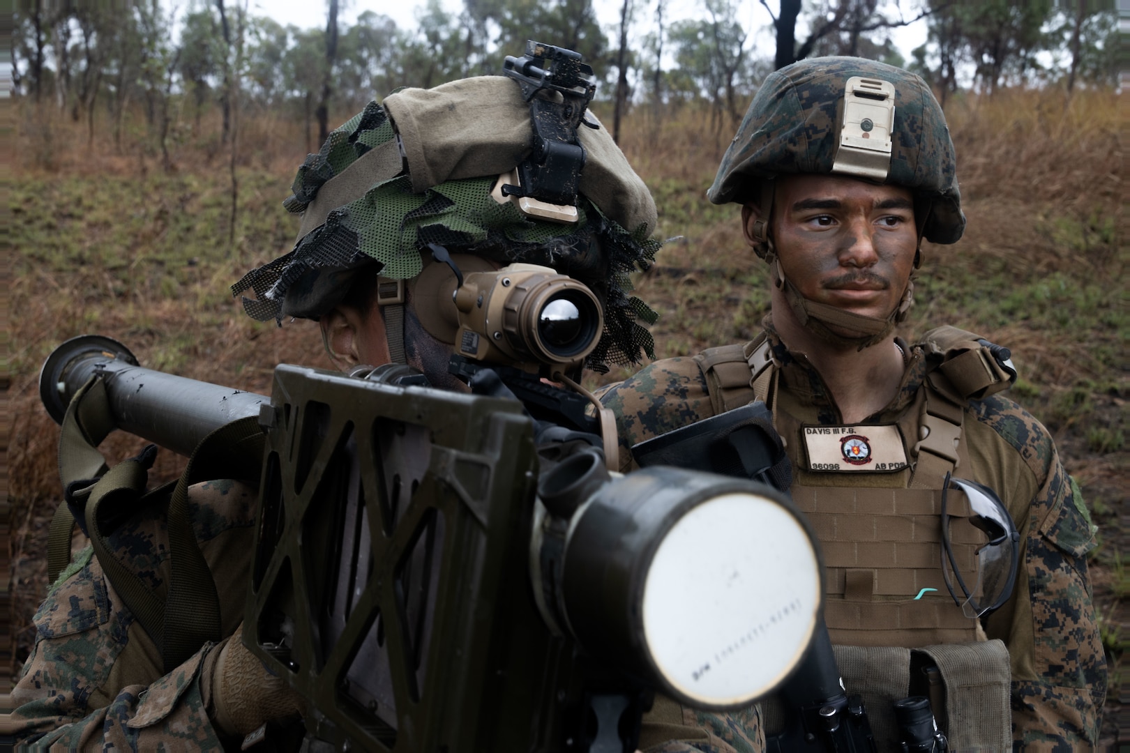 U.S. Marine Corps Cpl. Simon Li and Lance Cpl. Frank Davis III, both low altitude air defense gunners with Marine Medium Tiltrotor Squadron 265 (Rein.), 31st Marine Expeditionary Unit, prepare a FIM-92E stinger missile system during a forward arming and refueling point exercise at Shoalwater Bay Training Area, Australia, July 4, 2023. Marines with 2d LAAD provided a defensive posture for the FARP from aerial threats as part of an expeditionary advanced base of operations. The 31st MEU is operating aboard ships of the America Amphibious Ready Group in the 7th Fleet area of operations to enhance interoperability with allies and partners and serve as a ready response force to defend peace and stability in the Indo-Pacific region. (U.S. Marine Corps photo by Cpl. Christopher R. Lape)