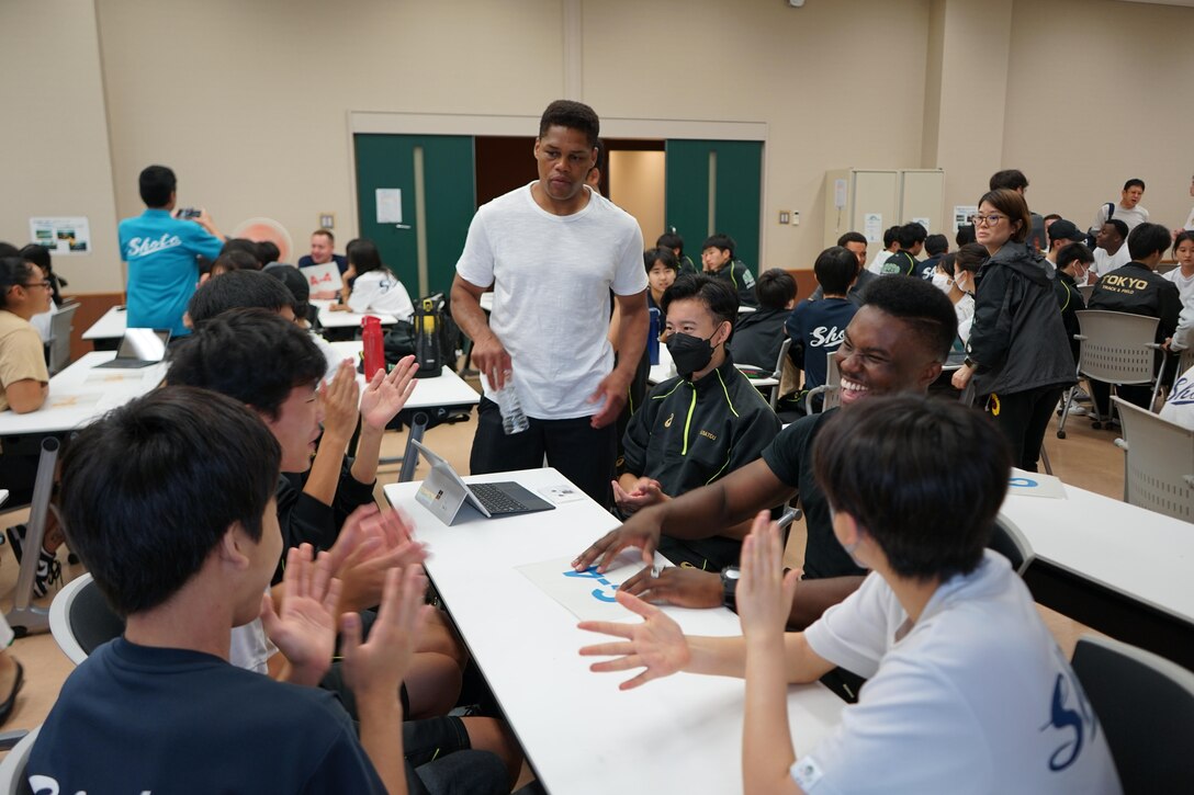 Marines from Combined Arms Training Center, Camp Fuji, Japan gave Japanese students unique experiences during a visit to the National Chuo Youth Friendship Center in Gotemba, Japan.  (Courtesy photos by Pvt. Victoria Sanchez)