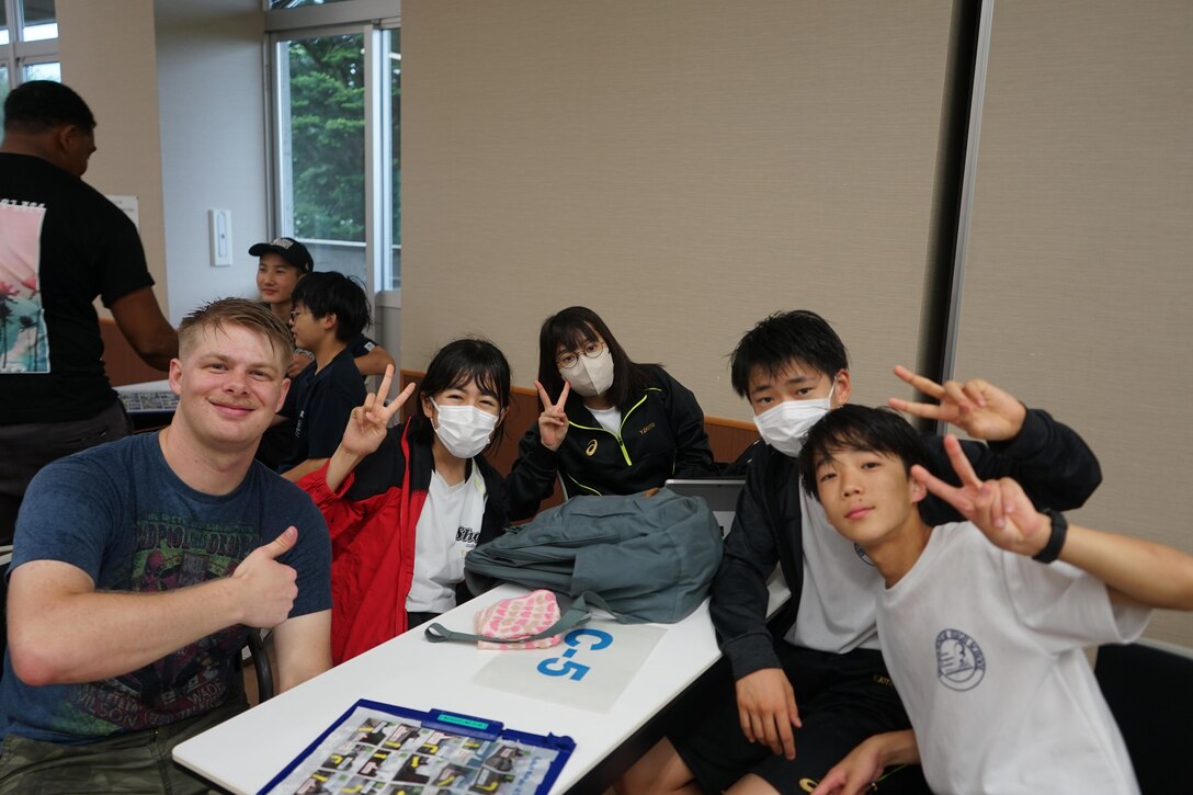 Marines from Combined Arms Training Center, Camp Fuji, Japan gave Japanese students unique experiences during a visit to the National Chuo Youth Friendship Center in Gotemba, Japan. (Courtesy photos by Pvt. Victoria Sanchez)