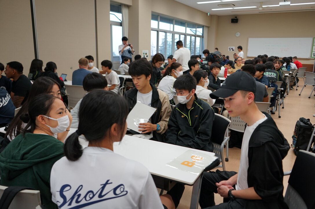Marines from Combined Arms Training Center, Camp Fuji, Japan gave Japanese students unique experiences during a visit to the National Chuo Youth Friendship Center in Gotemba, Japan. (Courtesy photos by Pvt. Victoria Sanchez)