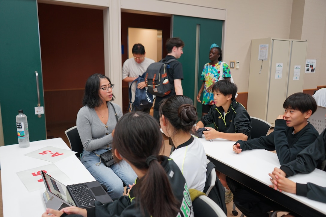Marines from Combined Arms Training Center, Camp Fuji, Japan gave Japanese students unique experiences during a visit to the National Chuo Youth Friendship Center in Gotemba, Japan. (Courtesy photos by Pvt. Victoria Sanchez)