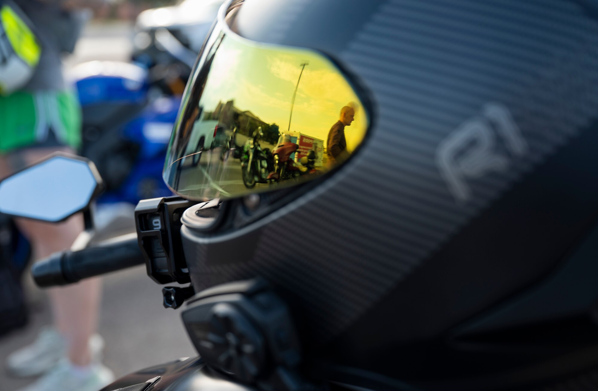 A motorcycle helmet is placed on top of a bike before the start of the motorcycle mentorship ride at Holloman Air Force Base, New Mexico, July 21, 2023.  Mentorship rides allow commanders to coordinate counseling and inspections of riders to ensure their motorcycles are safe to operate and they possess serviceable safety equipment. (U.S. Air Force photo by Airman 1st Class Michelle Ferrari)