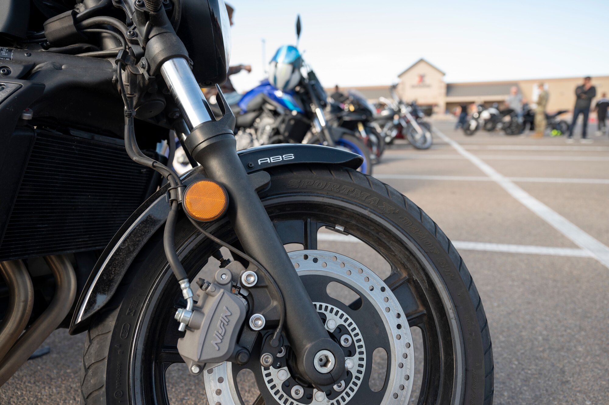 Members from Holloman rally together before group mentorship ride at Holloman Air Force Base, New Mexico, July 21, 2023.  Mentorship rides allow commanders to coordinate counseling and inspections of riders to ensure they’re motorcycles are safe to operate and they possess serviceable safety equipment. (U.S. Air Force photo by Airman 1st Class Michelle Ferrari)