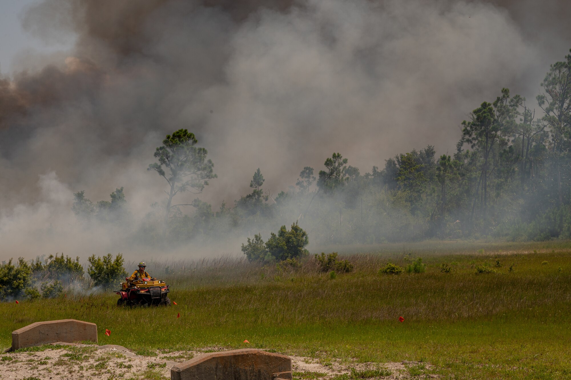 A person surveys the perimeter