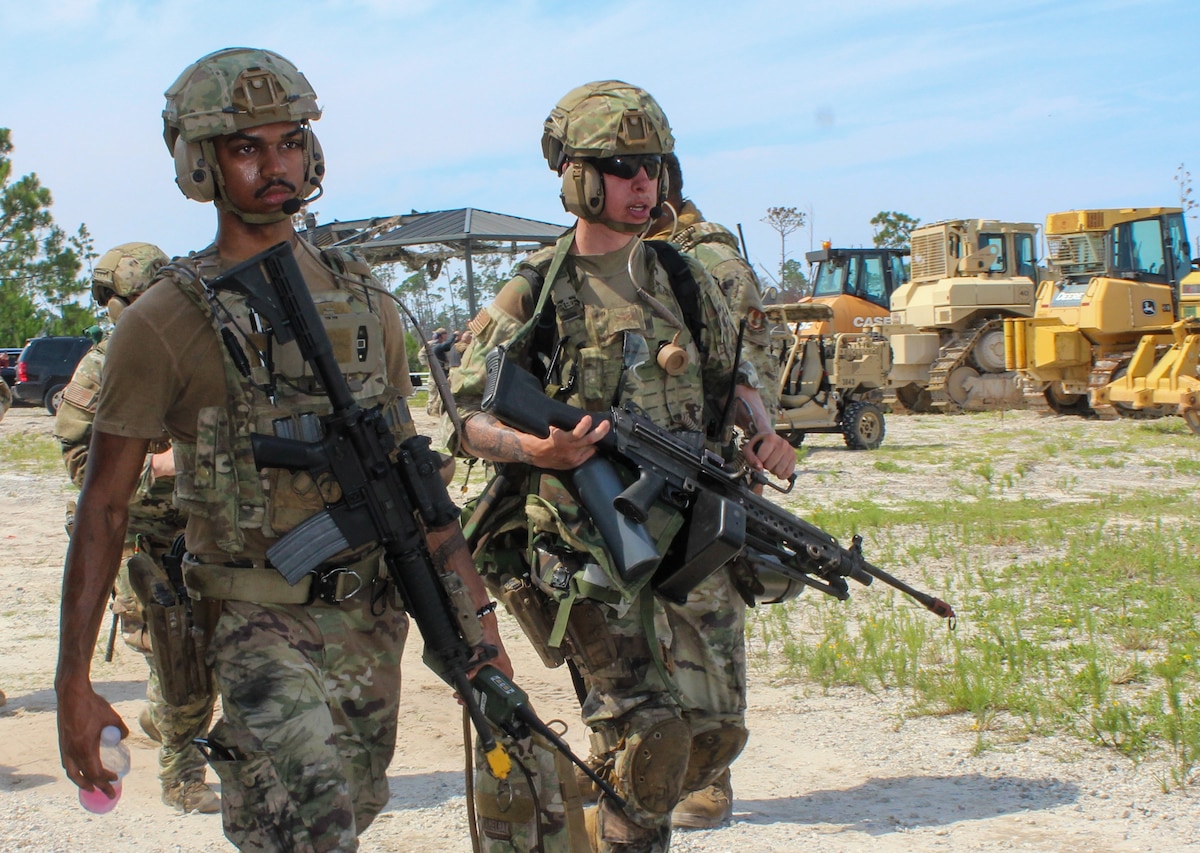 Airmen walking to a central starting location