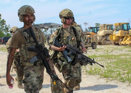 Airmen walking to a central starting location