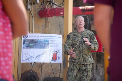 Joint Task Force-Red Hill (JTF-RH) Commander, U.S. Navy Vice Adm. John Wade briefs representatives from Hawaii state government agencies and the Hawaii House of Representatives during a tour of the Red Hill Bulk Fuel Storage Facility (RHBFSF), Halawa, Hawaii, July 27, 2023.