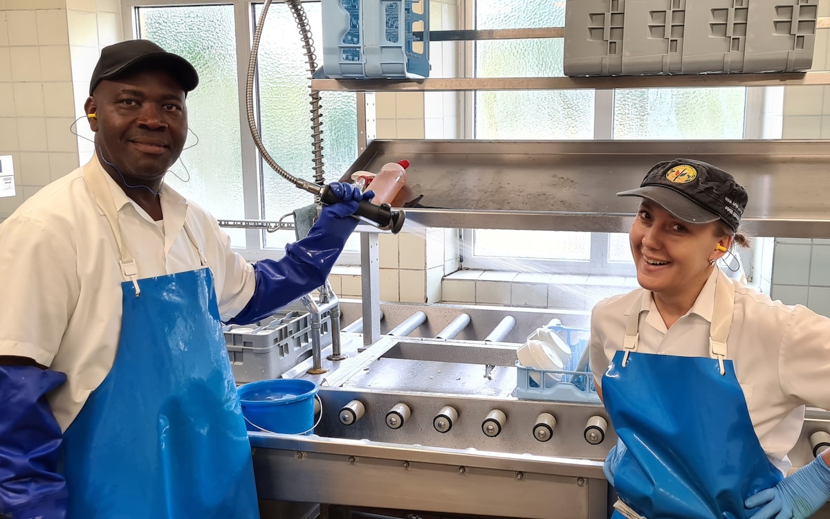 LRC Ansbach Food Service Workers support the Warfighter by cleaning dishes used at the “Wings of Victory” Warrior Restaurant.